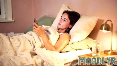 Scrolling Your Camera Roll at Night Isn't Nostalgia. Psychology Says It's a Search for Proof Your Life Is Real.